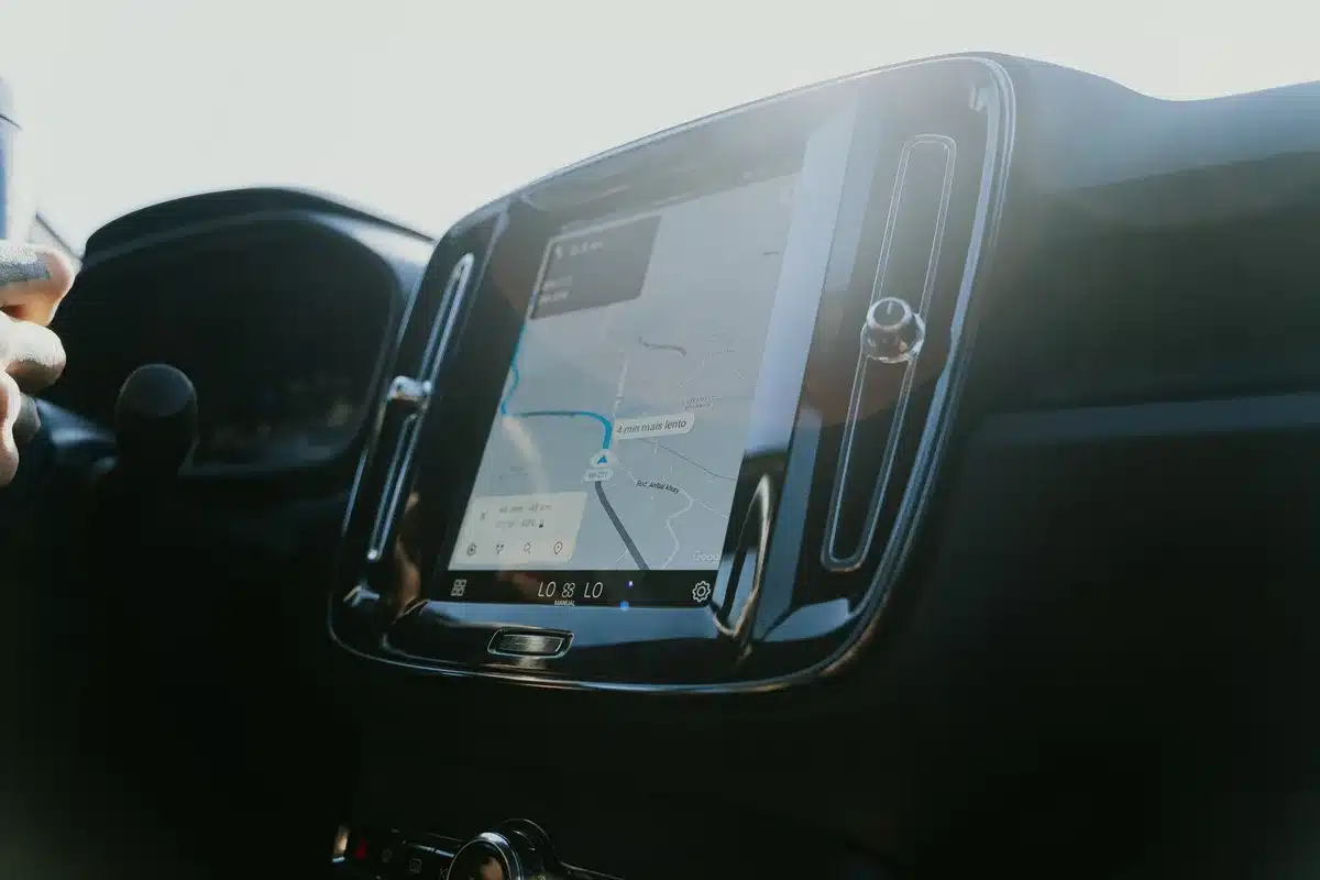 A map display showing GPS coordinates and a location pin marking a specific position with tracking history visible