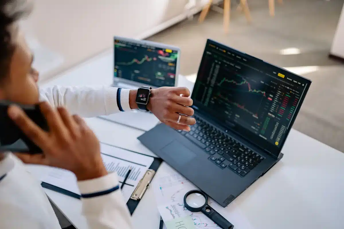 A sleek smartwatch display showing performance metrics and health data, modern minimalist interface, subtle glow from screen, technological precision