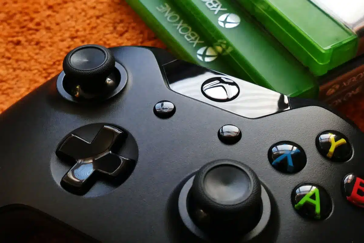 A split-screen comparison showing older gaming hardware components on the left in shadow, and modern 2026 gaming components on the right under bright light, representing the evolution of PC gaming standards.