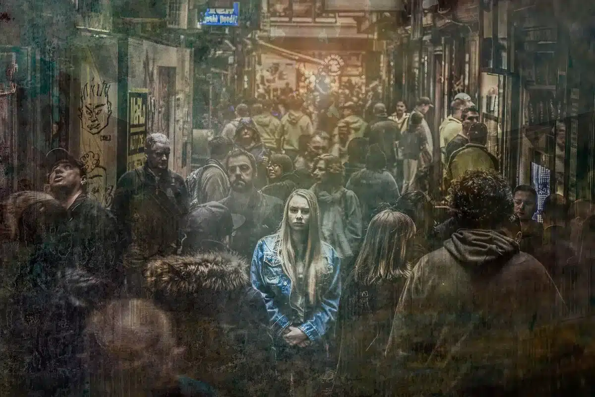 Anonymous crowd of shoppers viewing phones in a busy electronics mall, blurred faces, hands pointing at devices