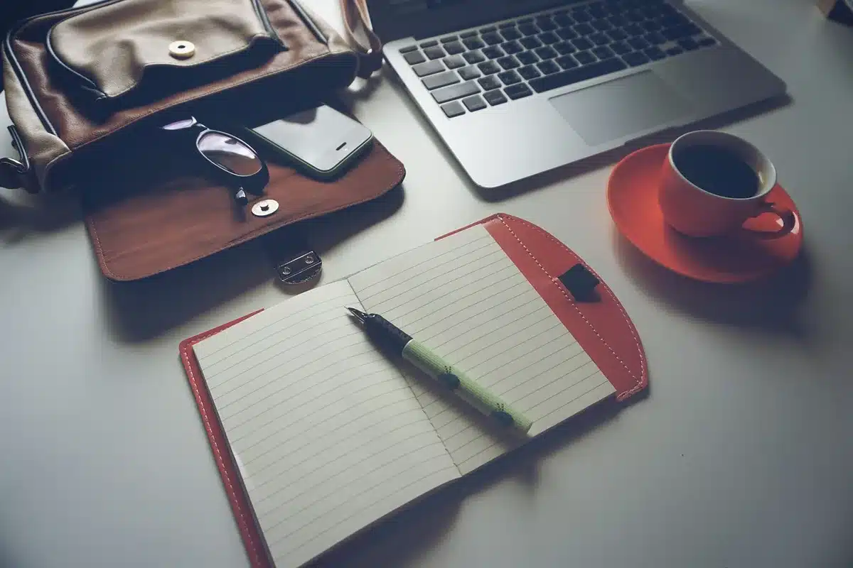 An empty, minimalist smartphone editing workspace with a blurred, extended landscape photo on the screen, no branding, soft natural light