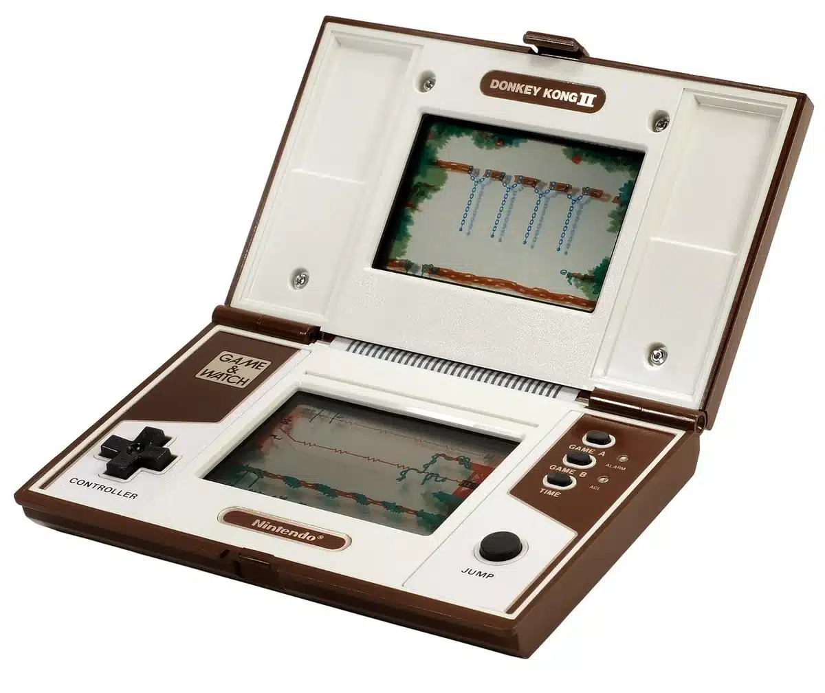 Anonymous hands holding a generic handheld console with store page on screen blurred