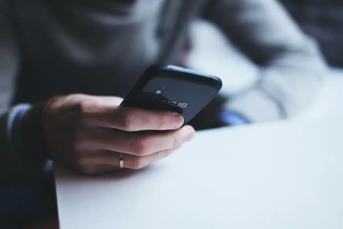 An empty smartphone screen showing a generic comments section with a floating GIF picker overlay; no logos or identifiable UI